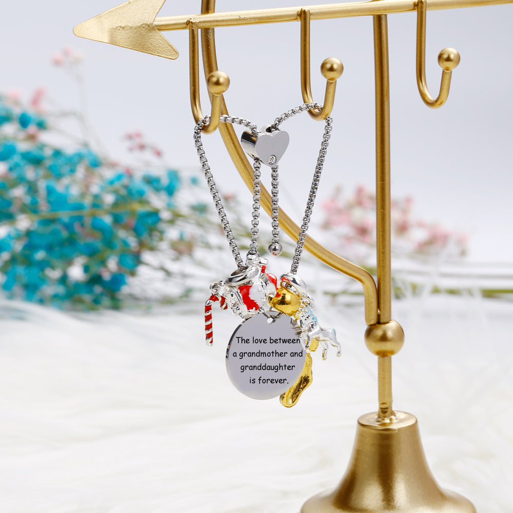 To My Granddaughter "The love between a grandmother and a granddaughter is forever." Pendant Bracelet