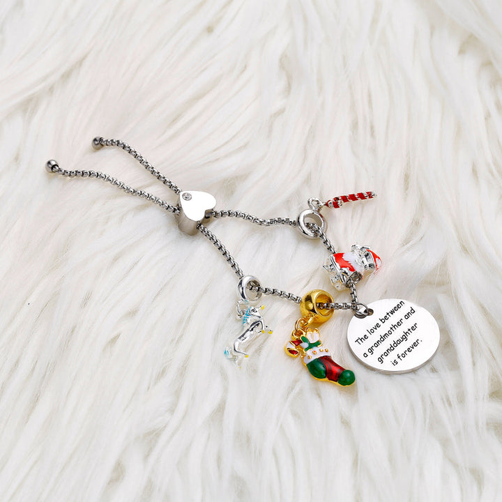 To My Granddaughter "The love between a grandmother and a granddaughter is forever." Pendant Bracelet