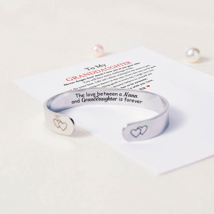 TO MY GRANDDAUGHTER "THE LOVE BETWEEN A NANA AND GRANDDAUGHTER IS FOREVER" HEART BRACELET - SARAH'S WHISPER