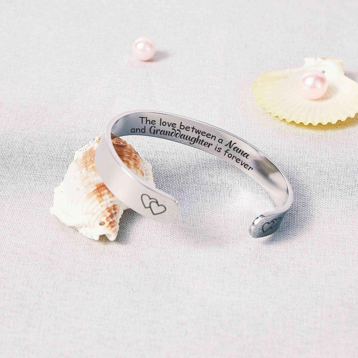 TO MY GRANDDAUGHTER "THE LOVE BETWEEN A NANA AND GRANDDAUGHTER IS FOREVER" HEART BRACELET - SARAH'S WHISPER