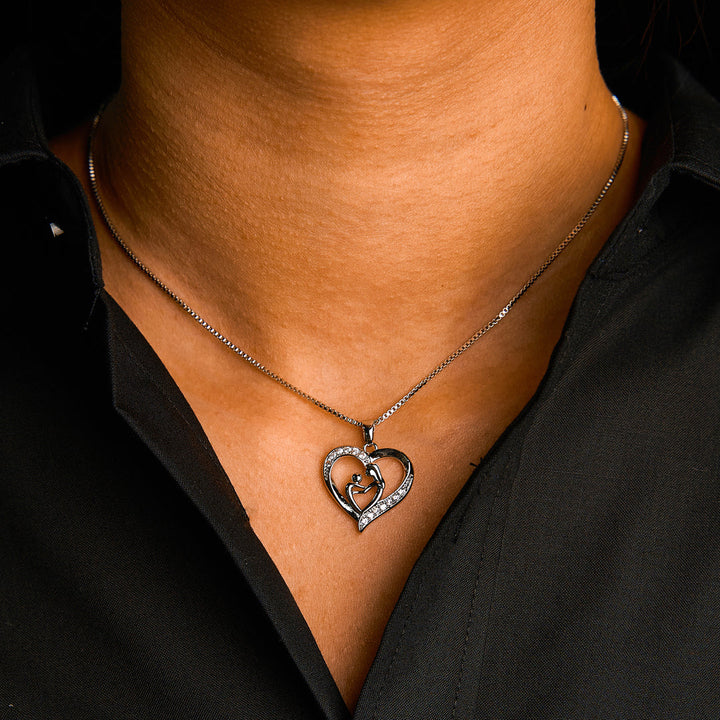 To My Daughter "The love between a mother and daughter is forever" Face to Face Necklace