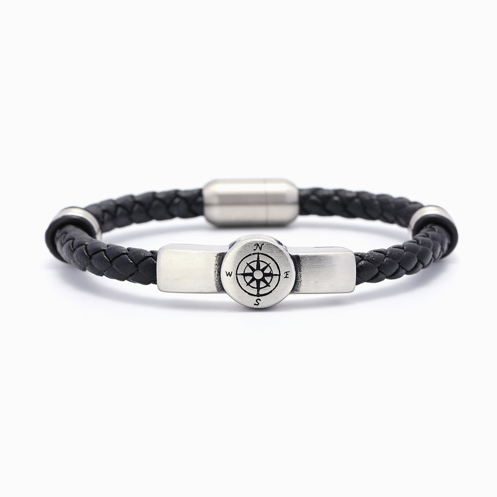 Compass bracelet designed to empower your grandson, featuring a compass motif as a symbol of courage. The image showcases a stylish bracelet adorned with a central compass, serving as a reminder to use fear as a guiding tool