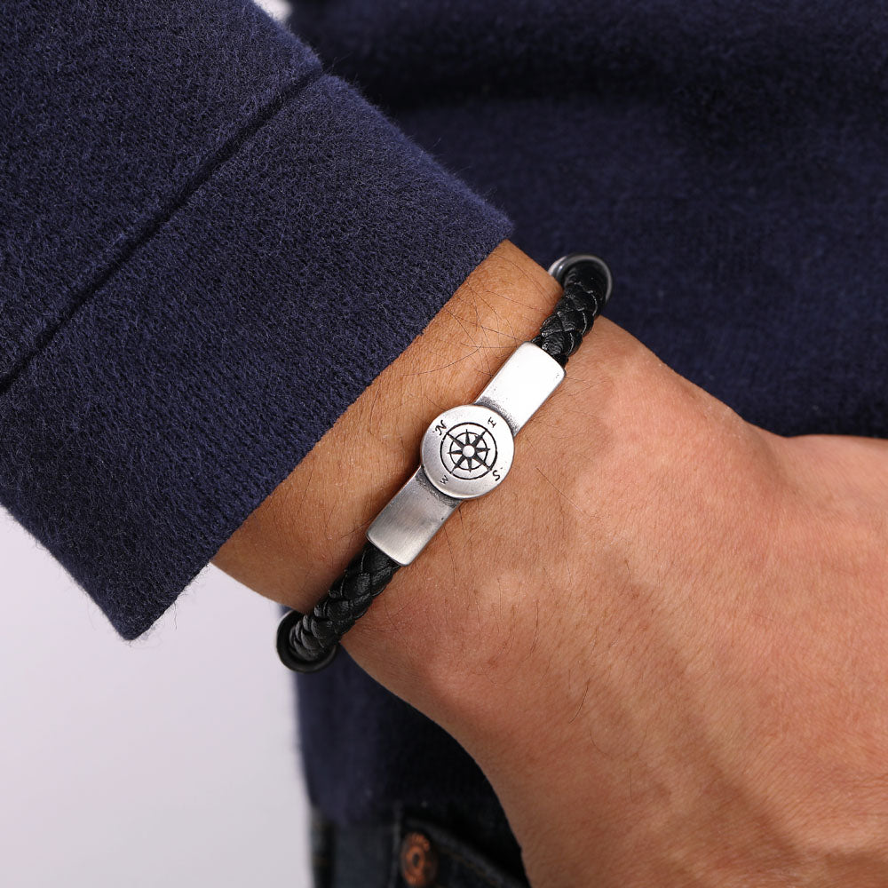 Compass bracelet designed to empower your grandson, featuring a compass motif as a symbol of courage. The image showcases a stylish bracelet adorned with a central compass, serving as a reminder to use fear as a guiding tool