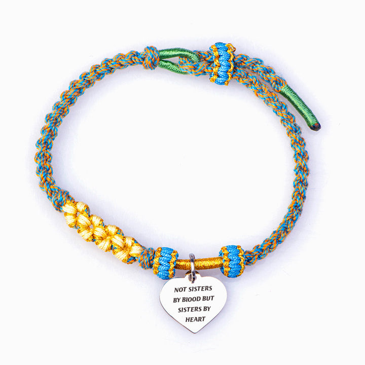 Braided bracelet with "Not Sisters by Blood but Sisters by Heart" design, crafted from cotton thread and titanium steel, ideal for best friends.