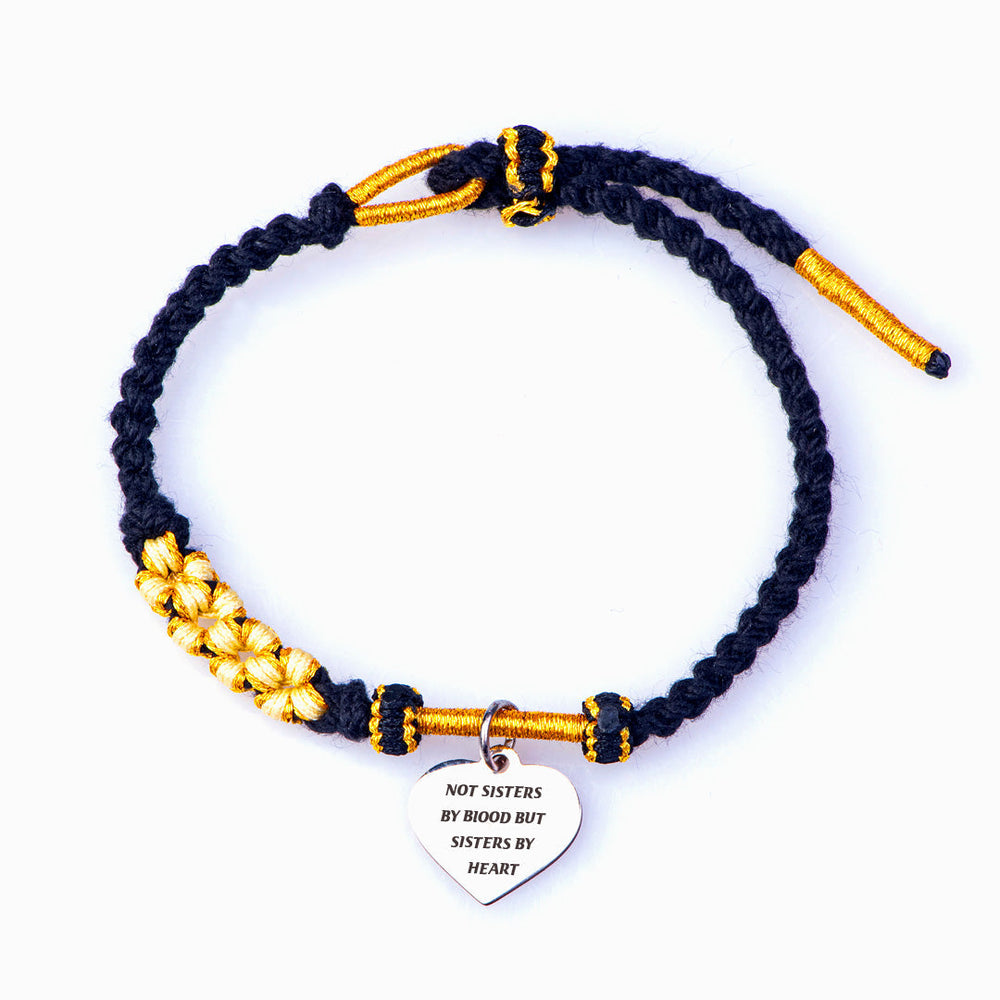 Braided bracelet with "Not Sisters by Blood but Sisters by Heart" design, crafted from cotton thread and titanium steel, ideal for best friends.