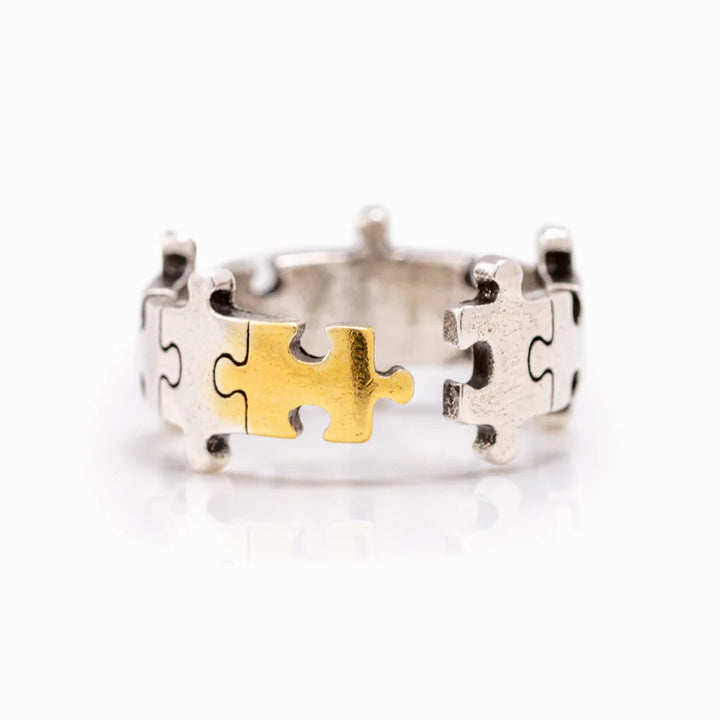 Copper puzzle ring with a gold-colored center, symbolizing uniqueness and special qualities, perfect gift for daughters.