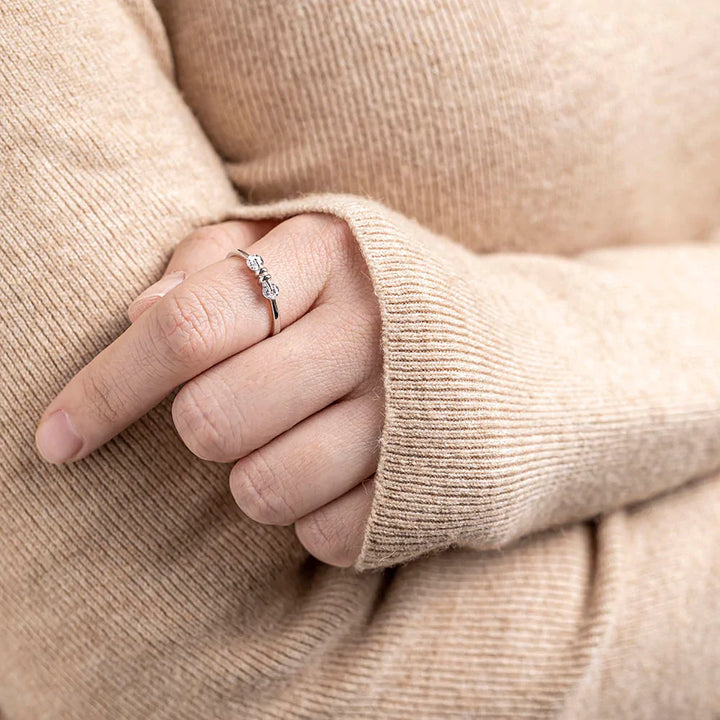 To My Granddaughter 'I Treasure You' Pearl Ring - A stunning S925 sterling silver ring featuring two pearls, symbolizing the precious bond between a grandmother and granddaughter. This elegant ring comes with a heartfelt greeting card, a gift box, and a gift bag. It serves as a reminder of the grandmother's pride, love, and cherished moments shared. Suitable for all ages.