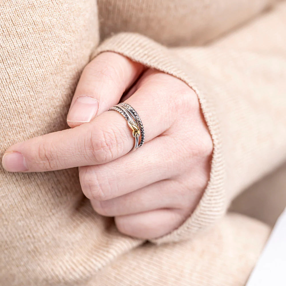 "To My Granddaughter 'I Will Go with You' Bond Infinity Ring - A special copper ring featuring a gold infinity symbol in the middle, symbolizing the eternal bond between grandmother and granddaughter. This meaningful gift comes with a heartfelt greeting card, a gift box, and a gift bag, reminding her that she always has your love and support. Suitable for all ages