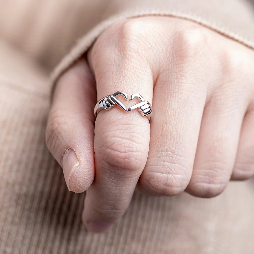 Heart gesture hand ring with intricate design, perfect for daughters of all ages. Alloy material with plating for durability and elegance. Complete gift package with ring, card, gift box, and bag. A meaningful gift to express eternal love and adoration.