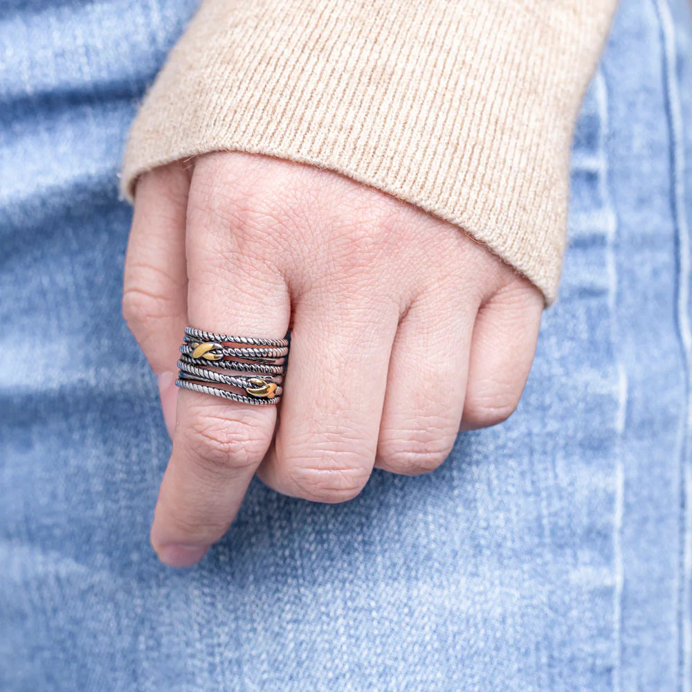 "To My Granddaughter 'I Will Go with You' Bond Infinity Ring - A special copper ring featuring a gold infinity symbol in the middle, symbolizing the eternal bond between grandmother and granddaughter. This meaningful gift comes with a heartfelt greeting card, a gift box, and a gift bag, reminding her that she always has your love and support. Suitable for all ages