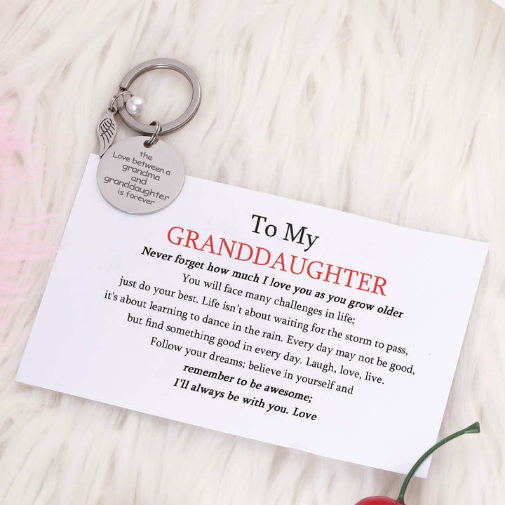 [Custom Name And Optional Address] To My GRANDDAUGHTER "The love between a [grandma] and granddaughter is forever" Key Ring [💞 Key Ring +💌 Gift Card + 🎁 Gift Box + 💐 Gift Bouquet] - SARAH'S WHISPER