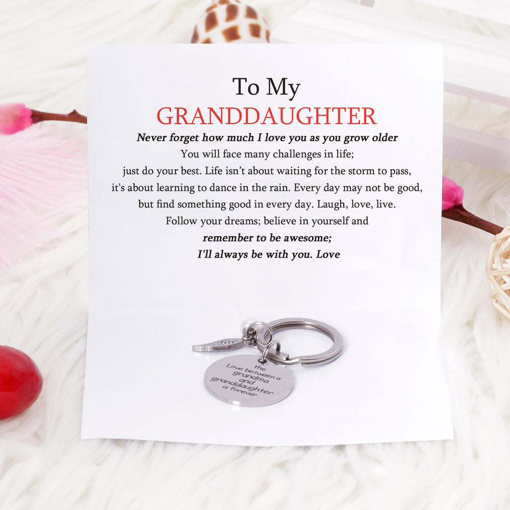 [Custom Name And Optional Address] To My GRANDDAUGHTER "The love between a [grandma] and granddaughter is forever" Key Ring [💞 Key Ring +💌 Gift Card + 🎁 Gift Box + 💐 Gift Bouquet] - SARAH'S WHISPER