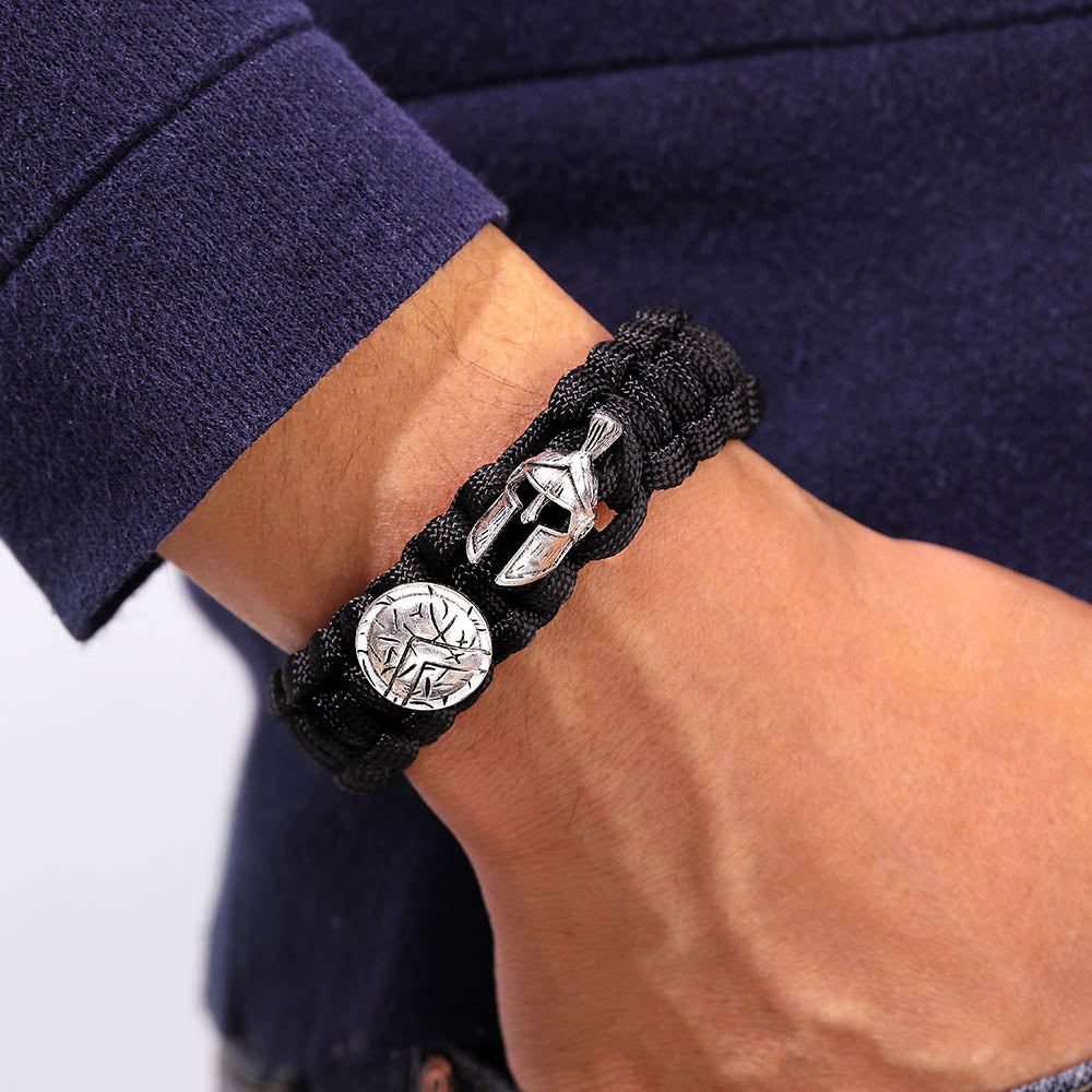 Stylish black bracelet with motivational card in a gift box.