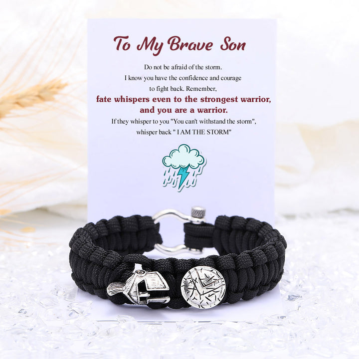 Black braided bracelet with motivational card in a gift box.