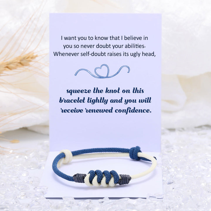 Blue cotton rope knot bracelet with an inspiring message card in a gift box.