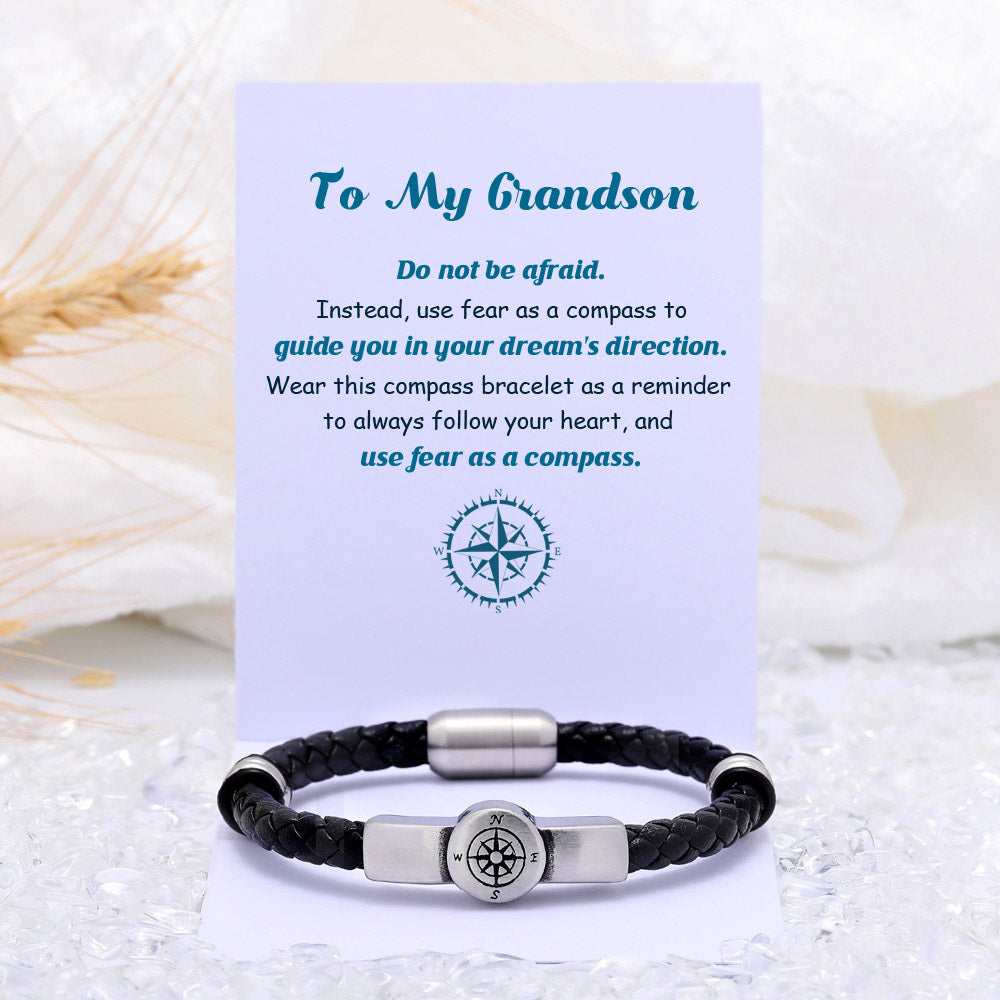 Compass bracelet designed to empower your grandson, featuring a compass motif as a symbol of courage. The image showcases a stylish bracelet adorned with a central compass, serving as a reminder to use fear as a guiding tool