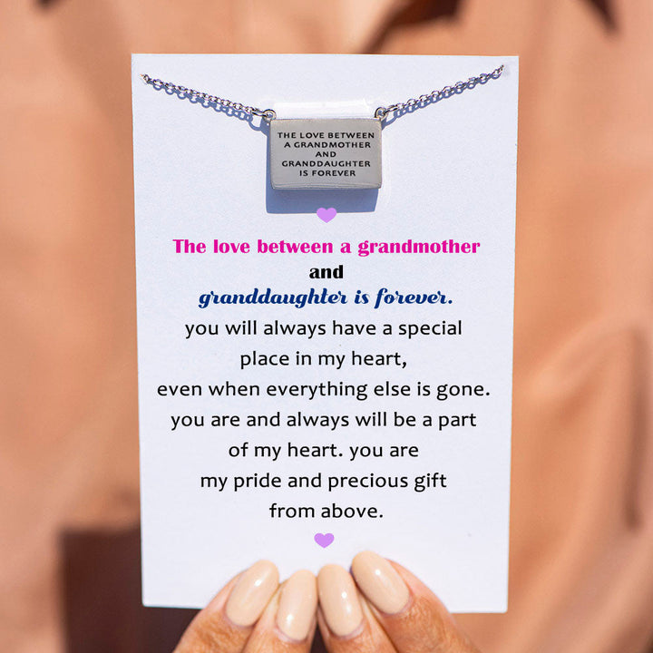 "To My Granddaughter 'The love between a grandmother and granddaughter is forever' Infinite Love Necklace in Titanium Steel with a heartfelt message card."