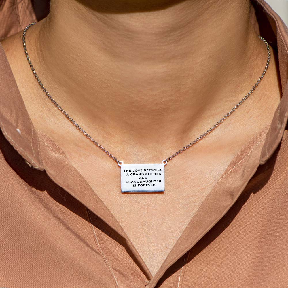 "To My Granddaughter 'The love between a grandmother and granddaughter is forever' Infinite Love Necklace in Titanium Steel with a heartfelt message card."