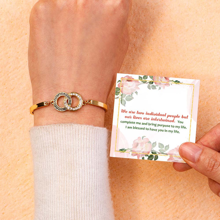 Elegant accord bracelet with heartfelt message card in a gift box.