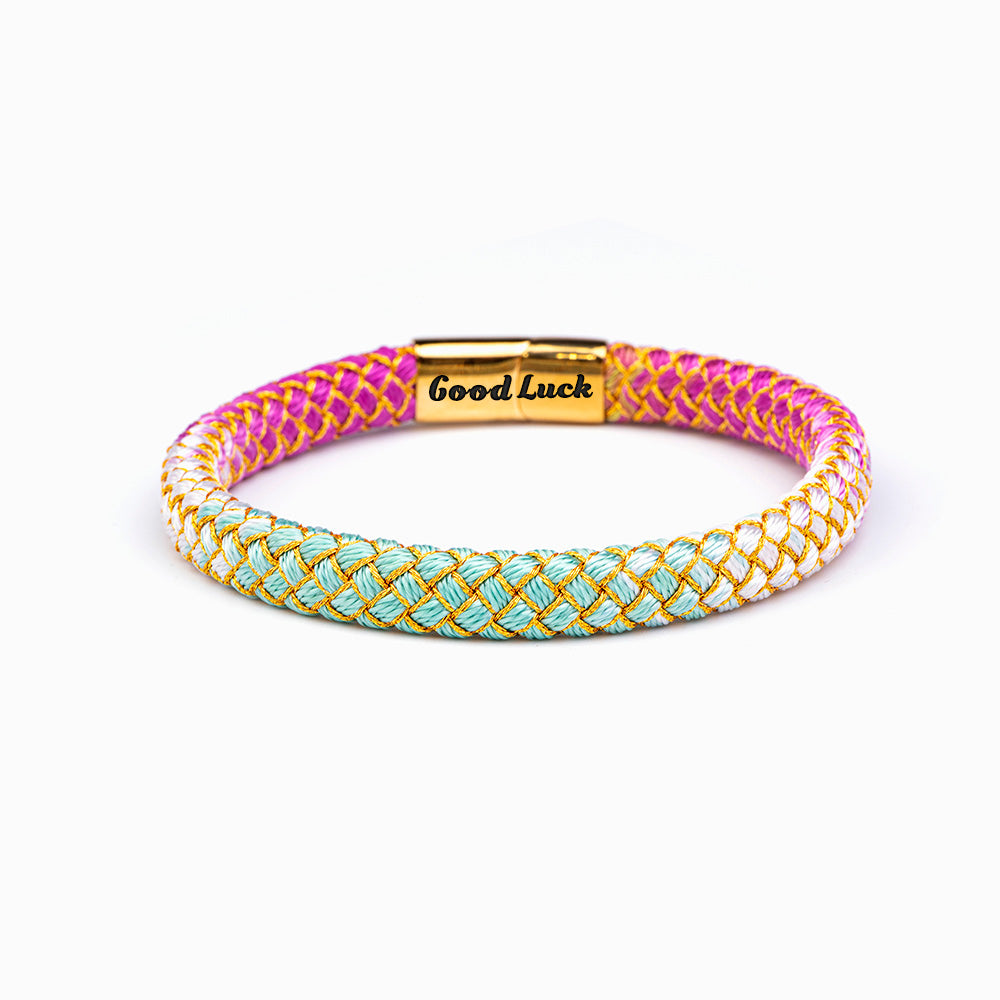 Colorful Luck Bracelet adorned with vibrant hues, perfect for gifting to your granddaughter. The image showcases a stylish bracelet featuring an array of colors, symbolizing positivity and hope