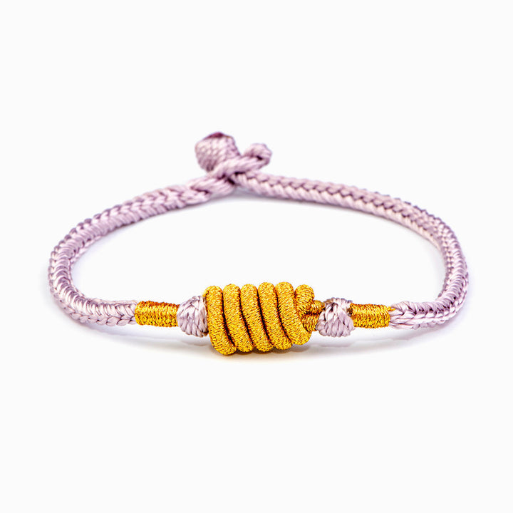 "The love between a grandmother and a granddaughter is infinite." Knot Bracelet for granddaughters, featuring a tight cotton rope knot symbolizing an unbreakable bond.