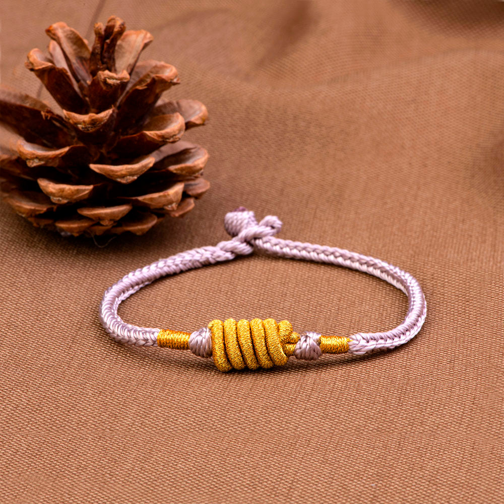 "The love between a grandmother and a granddaughter is infinite." Knot Bracelet for granddaughters, featuring a tight cotton rope knot symbolizing an unbreakable bond.