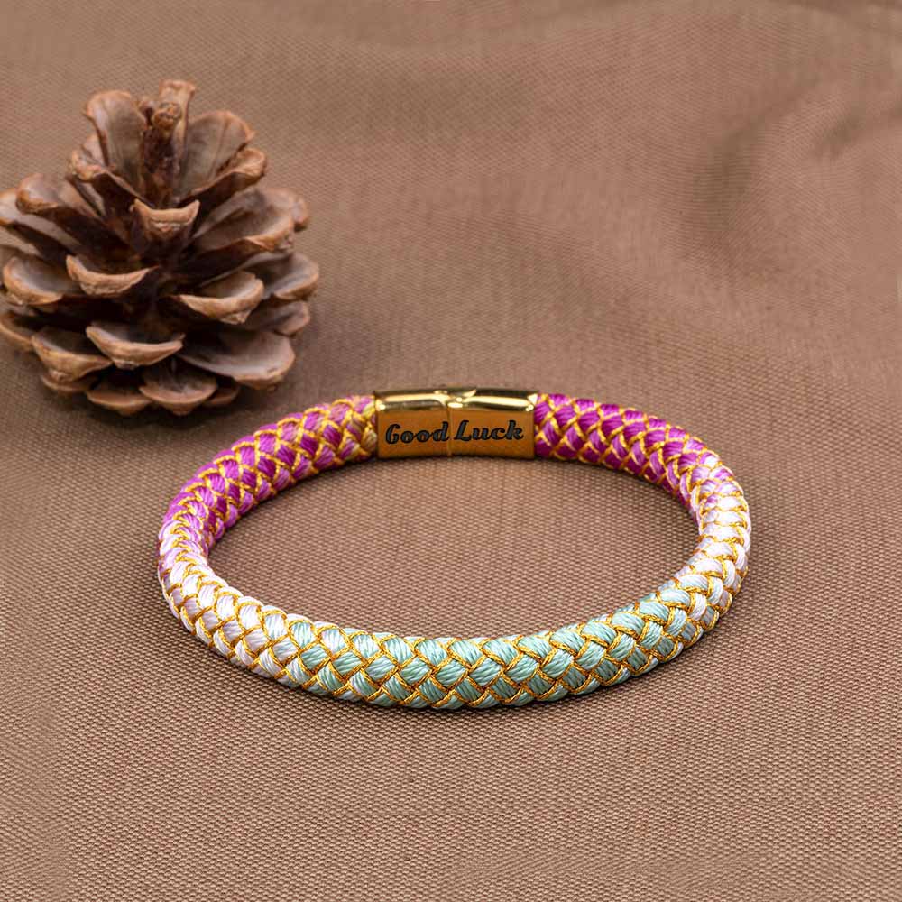 Colorful Luck Bracelet adorned with vibrant hues, perfect for gifting to your daughter. The image showcases a stylish bracelet featuring an array of colors, symbolizing positivity and motivation.