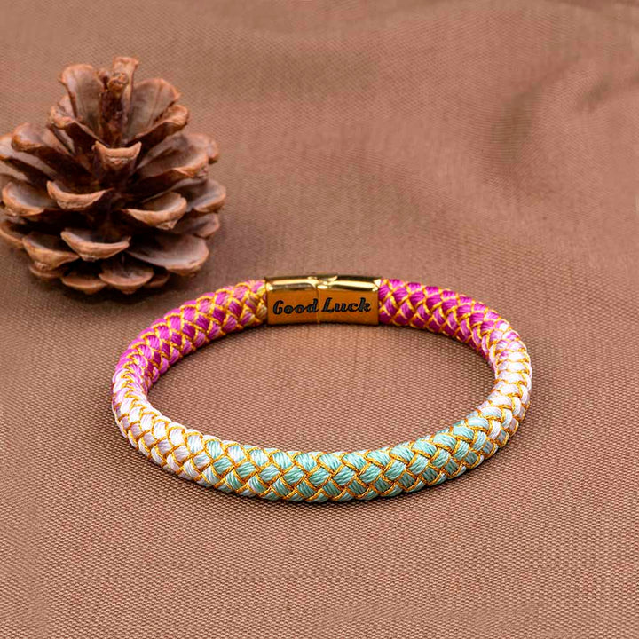 Colorful Luck Bracelet adorned with vibrant hues, perfect for gifting to your daughter. The image showcases a stylish bracelet featuring an array of colors, symbolizing positivity and motivation.